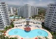 Buy 2+1 penthouse in Alanya, Mahmutlar district — furniture, 110 m² terrace, sea and mountain views 1