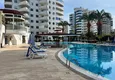 Buy 2+1 penthouse in Alanya, Mahmutlar district — furniture, 110 m² terrace, sea and mountain views 4