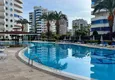 Buy 2+1 penthouse in Alanya, Mahmutlar district — furniture, 110 m² terrace, sea and mountain views 5