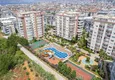 Buy 2+1 apartment for a residence permit in Alanya, Tosmur district - furniture, mountain and sea views 1 