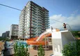 Buy 2+1 apartment in a complex with the developed infrastructure in Mahmutlar 1 