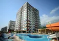 Buy 2+1 apartment in a complex with the developed infrastructure in Mahmutlar 12 