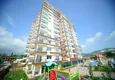 Buy 2+1 apartment in a complex with the developed infrastructure in Mahmutlar 15 