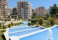 Buy Luxury residential complex in Tosmur, located just 200 meters from the sea, at the best prices! 84 
