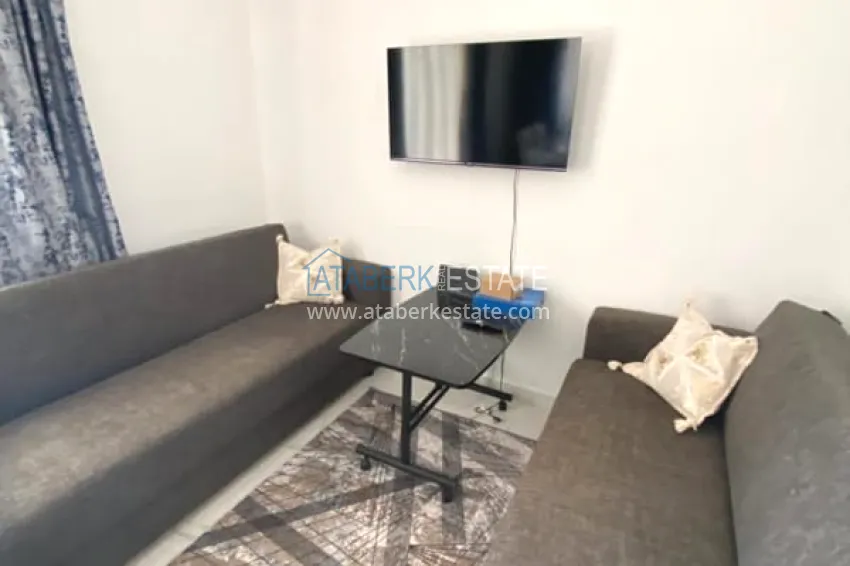 Purchase 1+1 apartment for rent in Mahmutlar for a summer vacation with new furniture No. 1 4