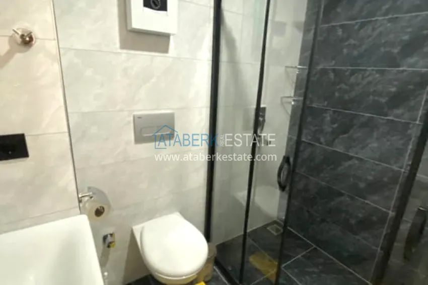 Purchase 1+1 apartment for rent in Mahmutlar for a summer vacation with new furniture No. 1 9