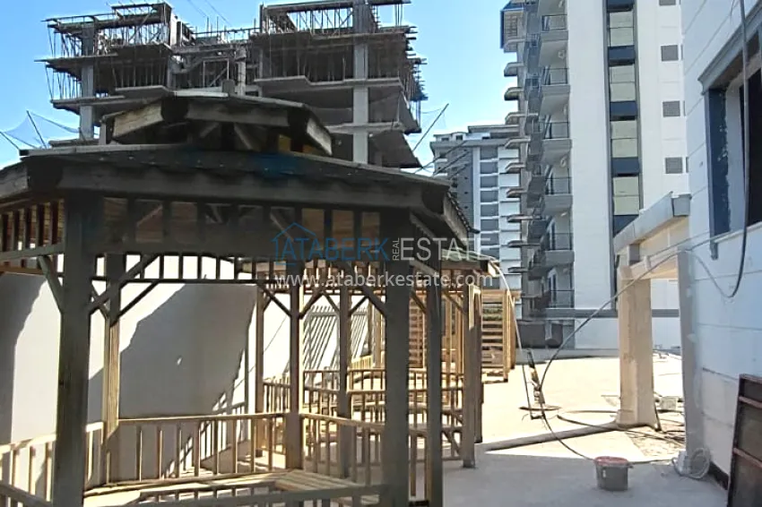 Finished 1+1 apartment in a multi-apartment residential complex in Mahmutlar — center 5