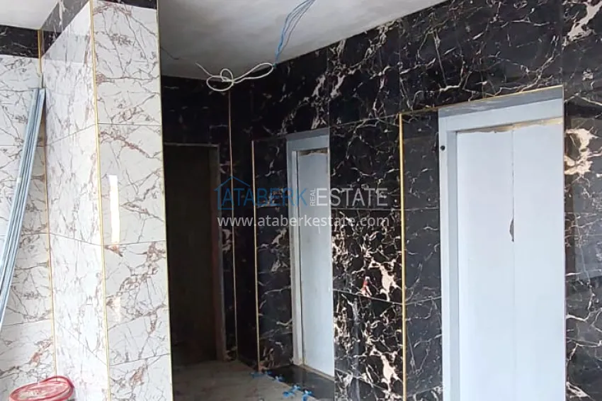 Finished 1+1 apartment in a multi-apartment residential complex in Mahmutlar — center 9