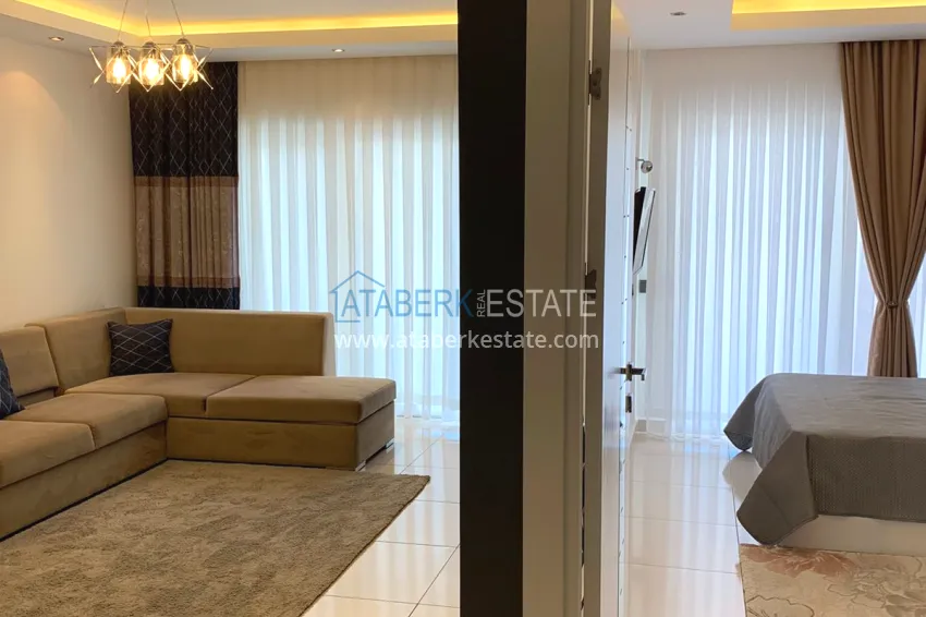 Purchase 1 + 1 apartment furnished in a premium complex, Tosmur area - Alanya 1