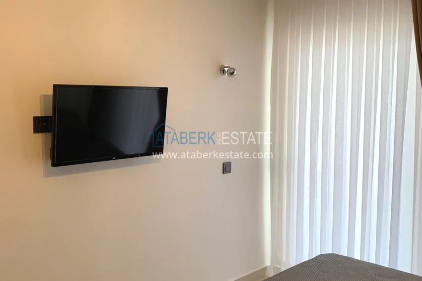 Purchase 1 + 1 apartment furnished in a premium complex, Tosmur area - Alanya 6