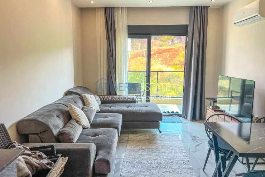 Purchase 1+1 apartment with furniture and mountain views in a new complex, Oba district — Alanya 4