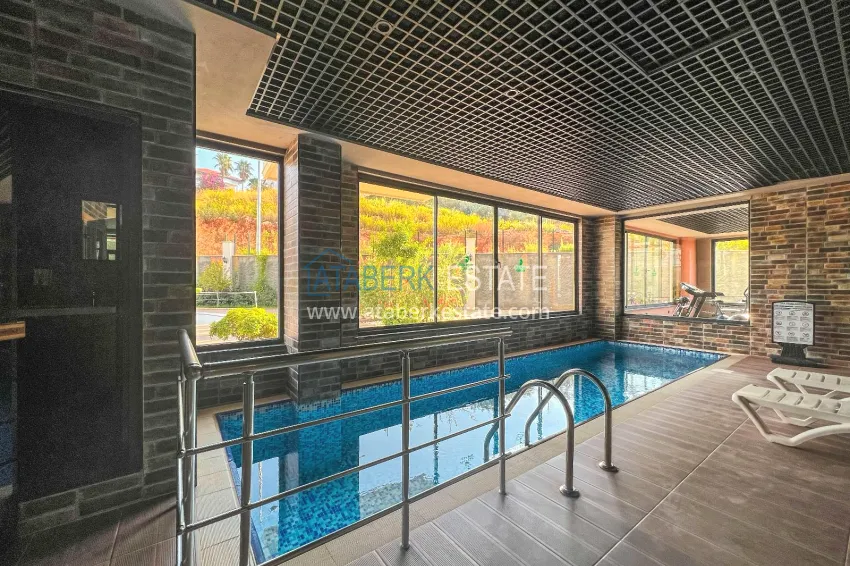 1+1 apartment with furniture and mountain views in a new complex, Oba district — Alanya 8