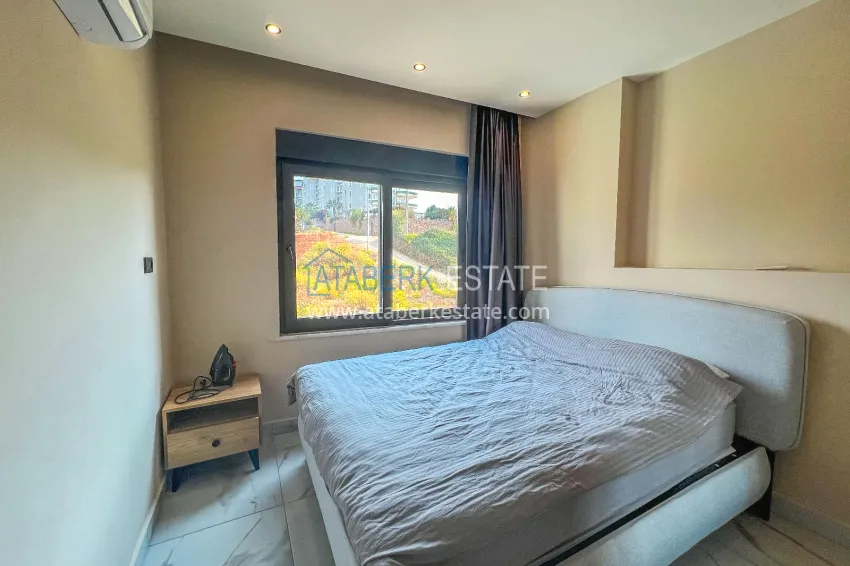 Purchase 1+1 apartment with furniture and mountain views in a new complex, Oba district — Alanya 9