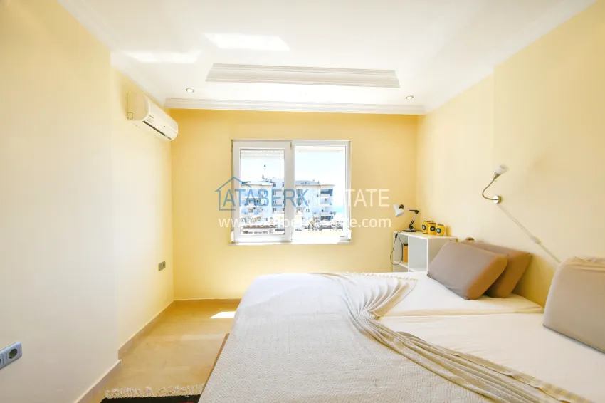 Purchase Two-bedroom apartment on the beachfront - Tosmur district, Alanya 14