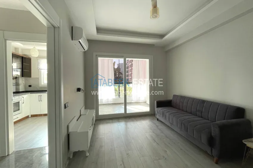 Purchase One bedroom apartment with new furniture, separate kitchen and 2 balconies in Mersin, Tomyuk 4