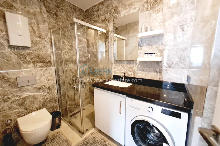Purchase Profitable turnkey apartment in the center of Alanya at a bargain price 12