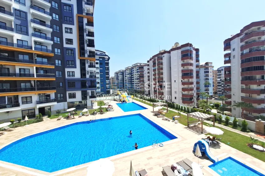 Purchase 1+1 apartment, 50 m² in Mahmutlar - partially furnished, from owner 14