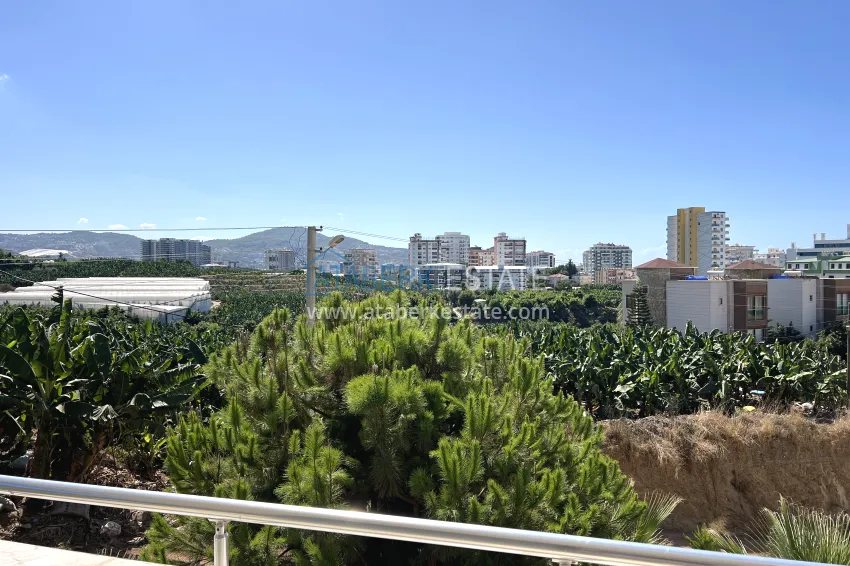 Purchase 2+1 apartment with furniture and mountain views in Mahmutlar at an attractive price 13