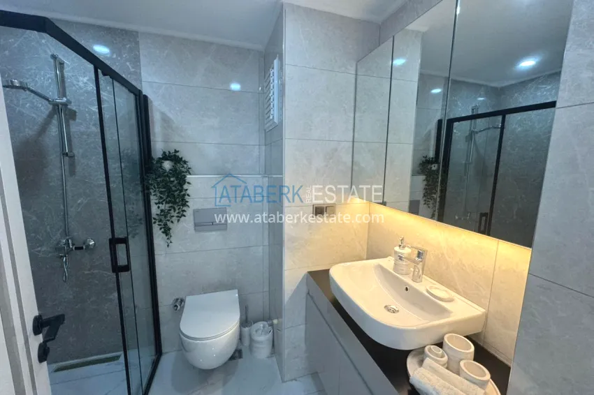 Purchase Investor offer — a one-bedroom apartment in a complex under construction, Altintash district, Antalya 11