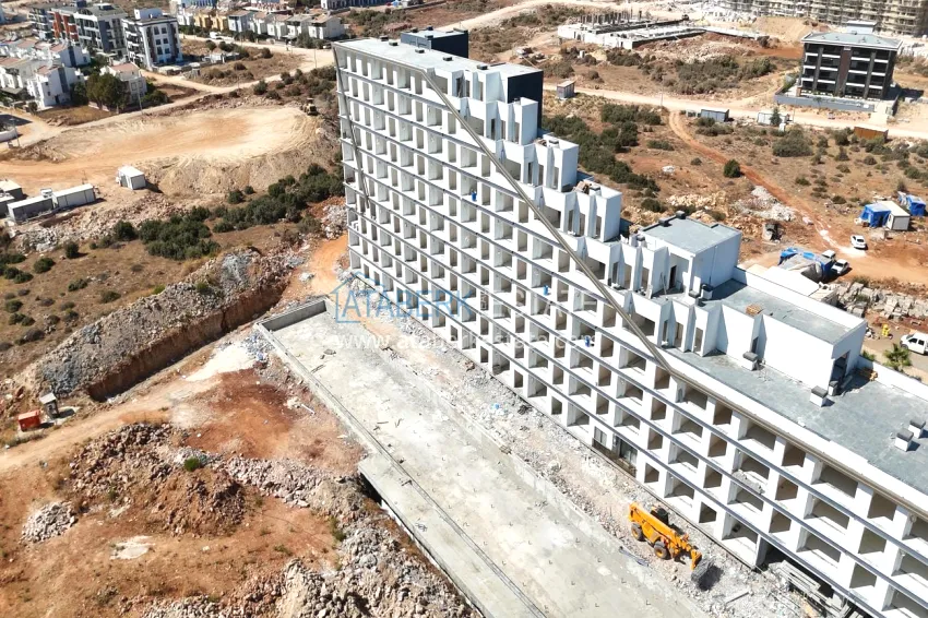 Investor offer — a one-bedroom apartment in a complex under construction, Altintash district, Antalya 11