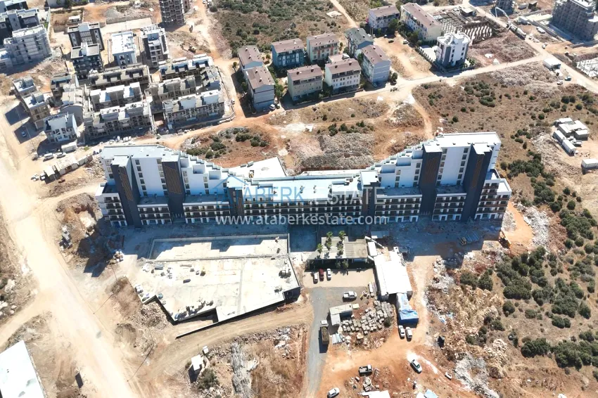 Investor offer — a one-bedroom apartment in a complex under construction, Altintash district, Antalya 15