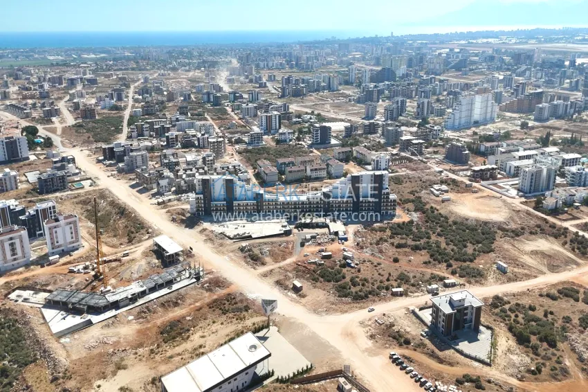 Investor offer — a one-bedroom apartment in a complex under construction, Altintash district, Antalya 16