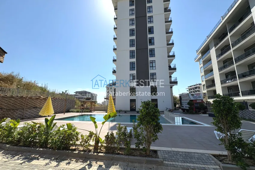 New 1+1 apartment in Mahmutlar, Alanya — new building with mountain views 1