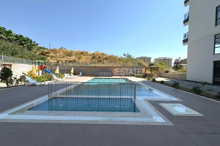 New 1+1 apartment in Mahmutlar, Alanya — new building with mountain views 3