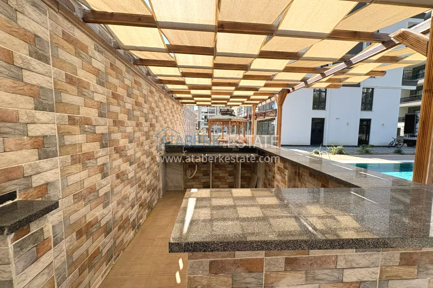 New 1+1 apartment in Mahmutlar, Alanya — new building with mountain views 9