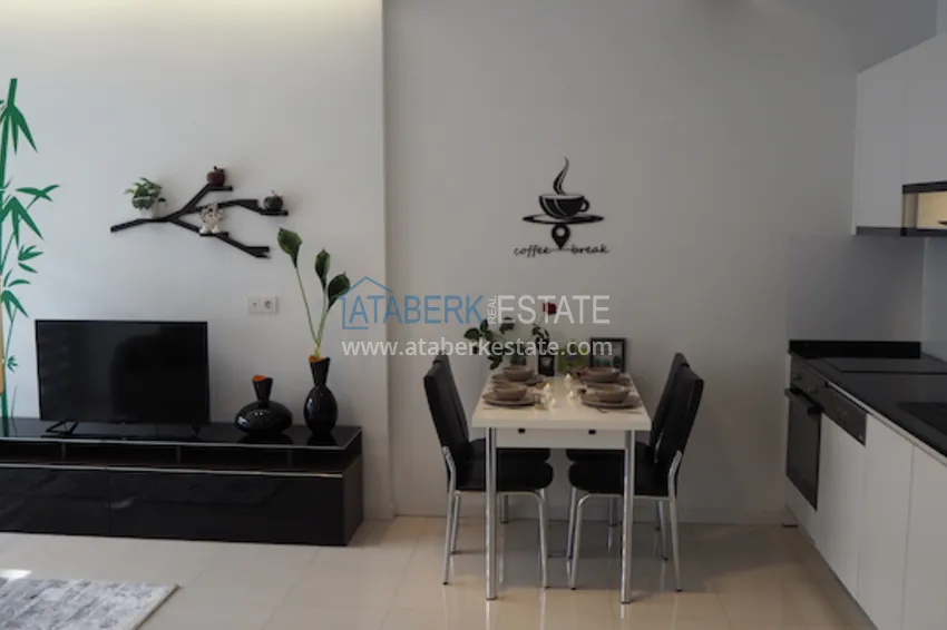 Purchase  1+1 apartment, located 50 meters from the sea in Oba center 26 