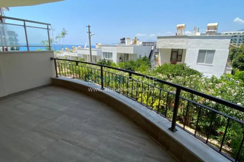 Purchase  Luxurious duplex apartment with garden access and sea views in Kargicak 11 