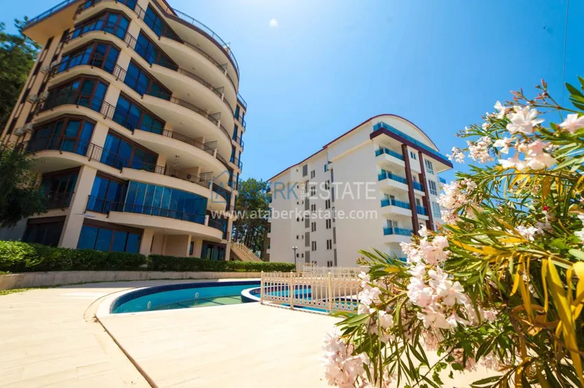 Luxurious duplex apartment with garden access and sea views in Kargicak 12 