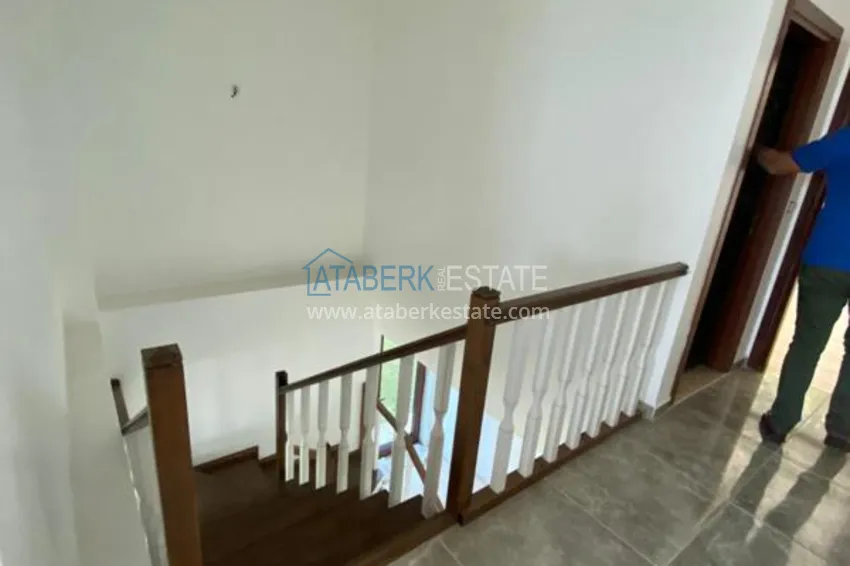 Purchase  Luxurious duplex apartment with garden access and sea views in Kargicak 13 