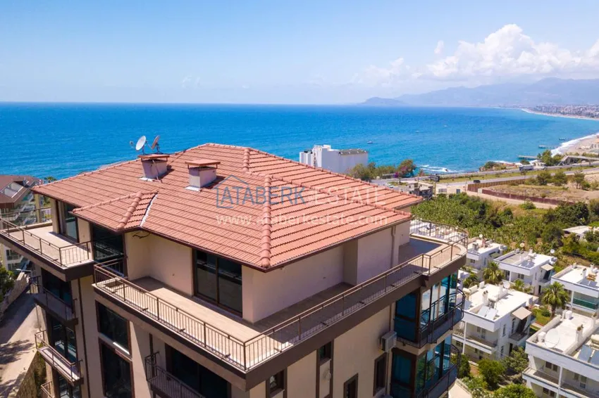 Luxurious duplex apartment with garden access and sea views in Kargicak 17 