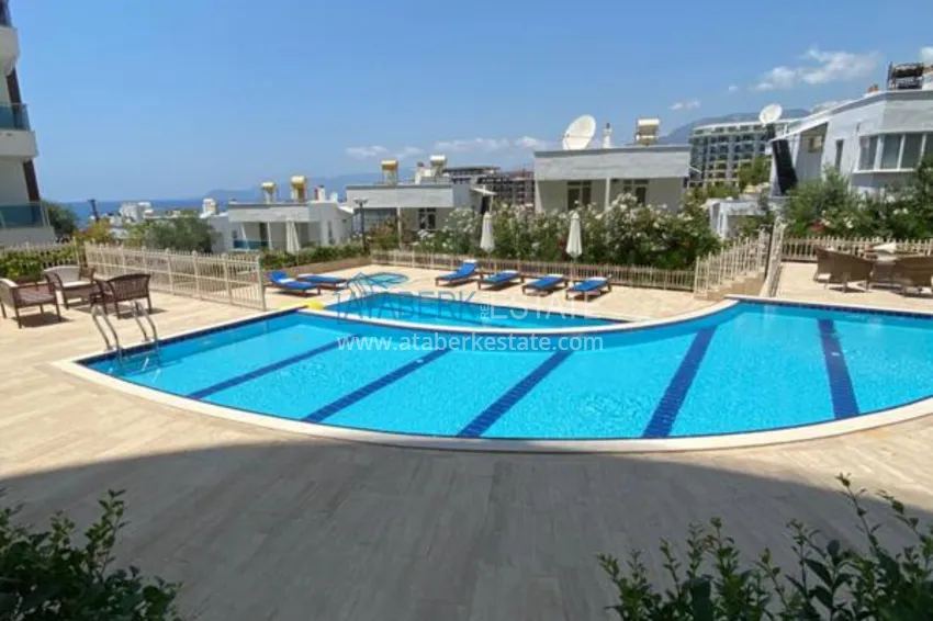 Luxurious duplex apartment with garden access and sea views in Kargicak 19 