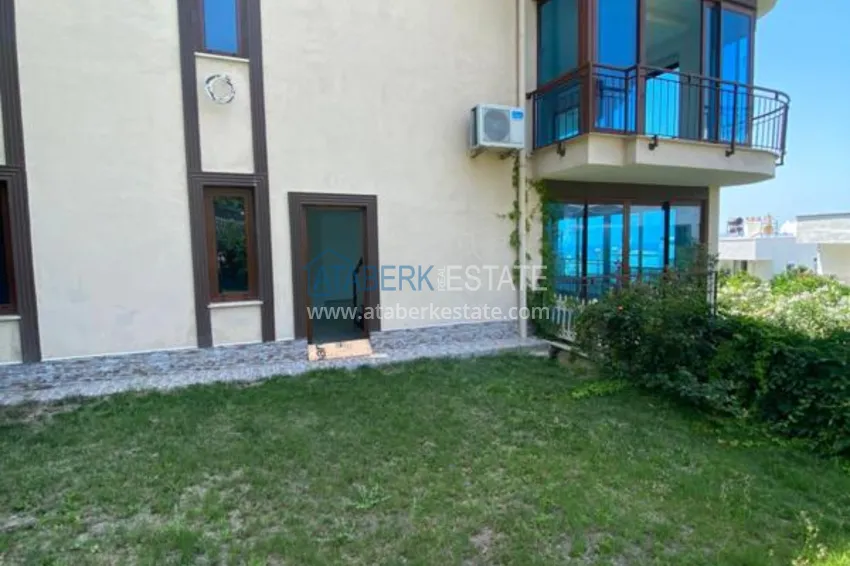 Luxurious duplex apartment with garden access and sea views in Kargicak 20 