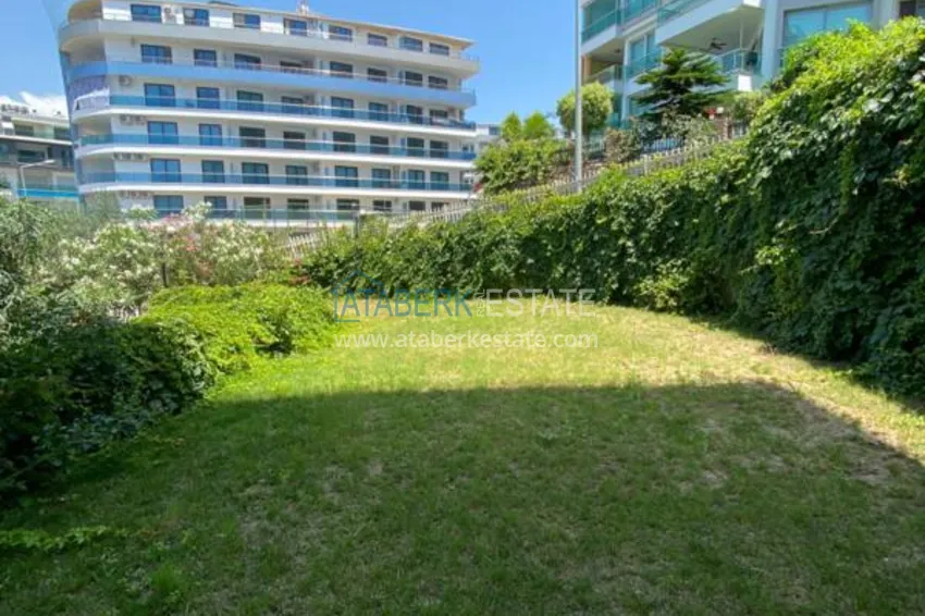 Luxurious duplex apartment with garden access and sea views in Kargicak 21 