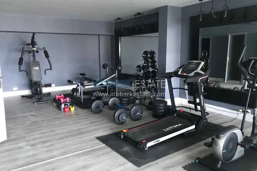 Luxurious duplex apartment with garden access and sea views in Kargicak 24 