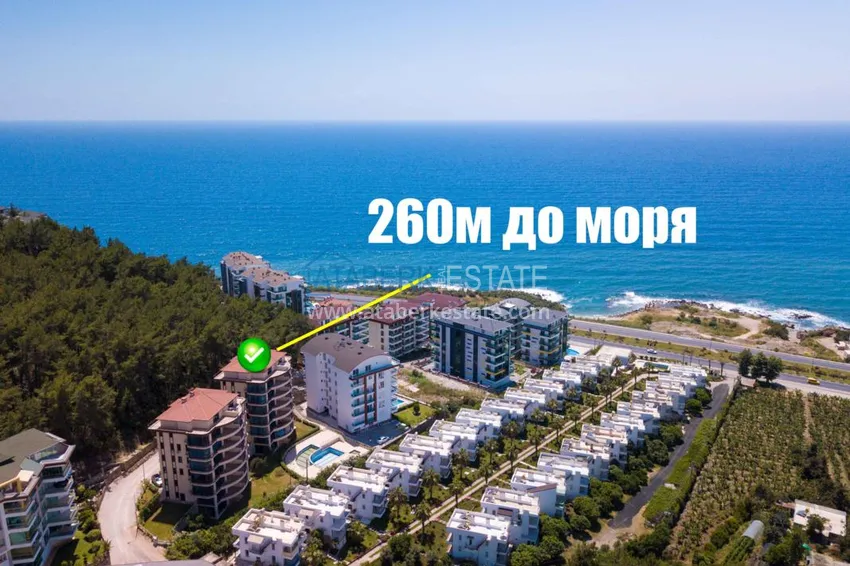 Luxurious duplex apartment with garden access and sea views in Kargicak 3 