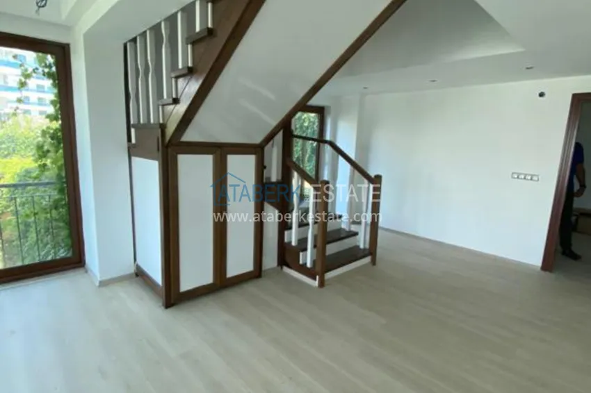 Purchase  Luxurious duplex apartment with garden access and sea views in Kargicak 6 