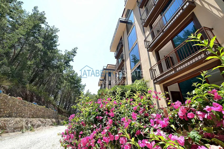 Luxurious duplex apartment with garden access and sea views in Kargicak 8 
