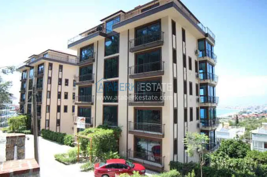 Luxurious duplex apartment with garden access and sea views in Kargicak 9 