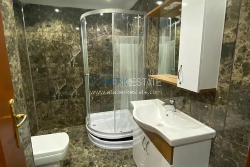 Purchase  Luxurious duplex apartment with garden access and sea views in Kargicak 9 