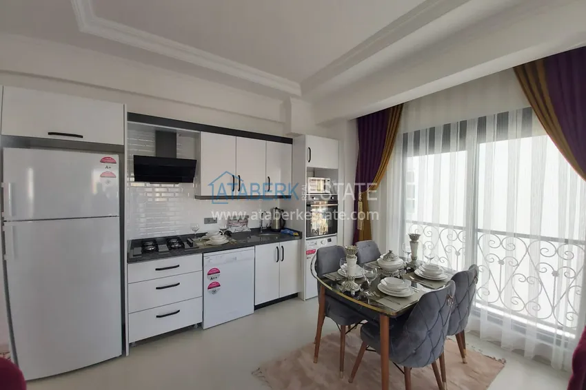 Purchase  Stylishly designed flat at the brand new building in Mahmutlar  10 