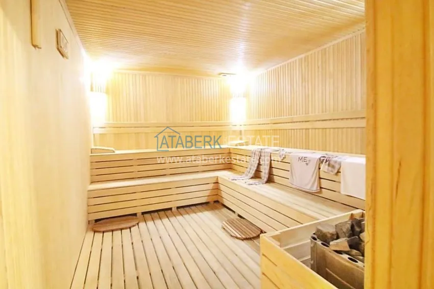 Flat in Mahmutlar with a glazed balcony in a new complex 13 