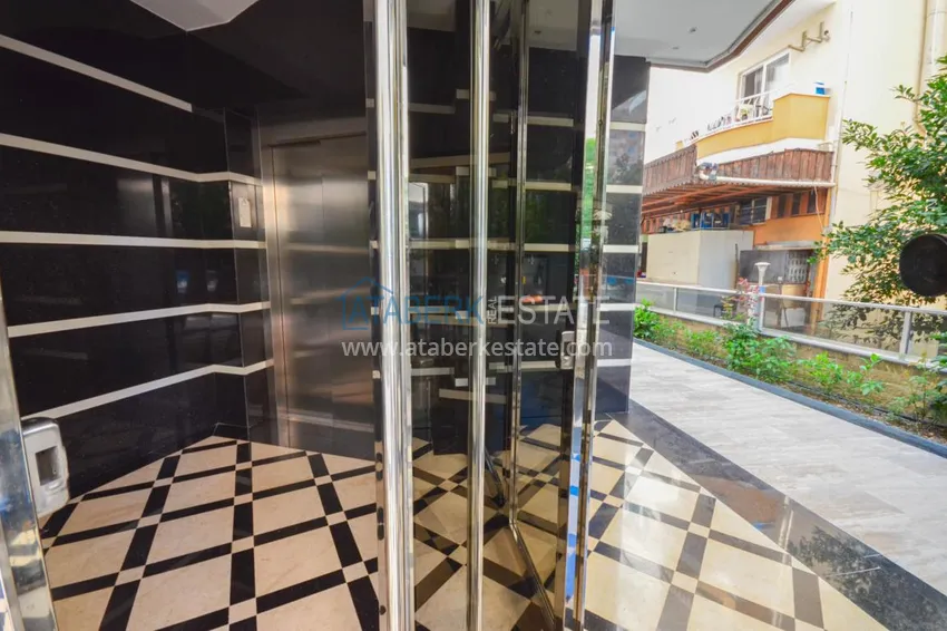 Flat in Mahmutlar with a separate kitchen and a partial sea view  13 