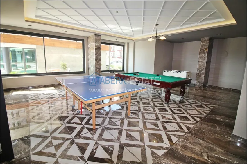 Flat with a sea view in a new complex on the coast  28 