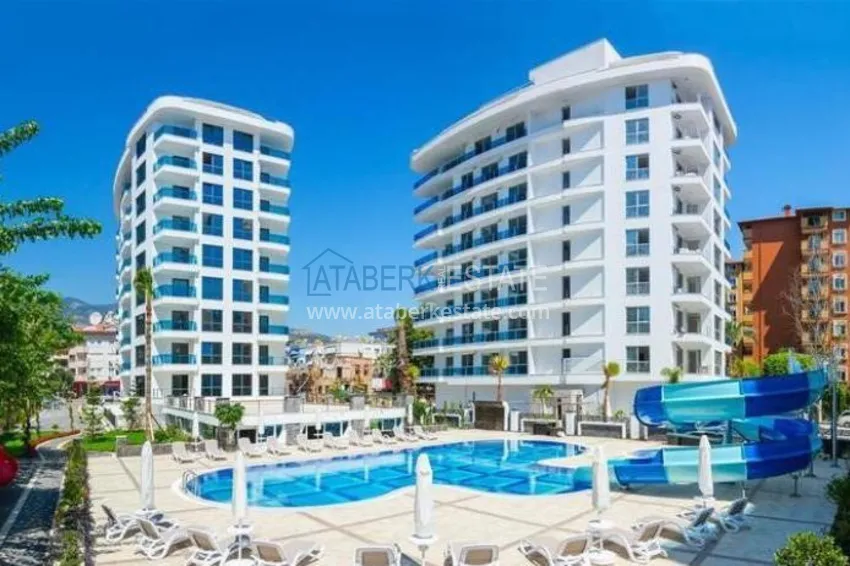 Furnished flat in a new complex with it's own beach in Alanya 1 