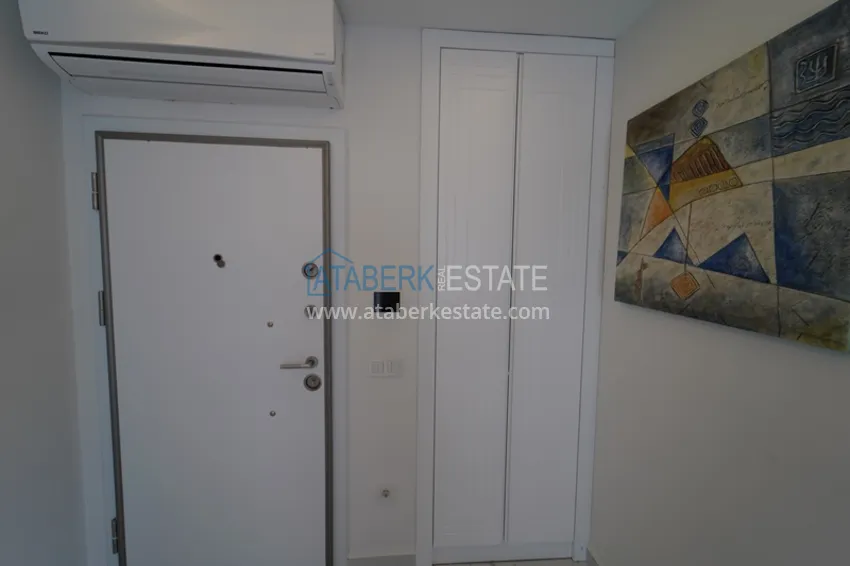 Purchase Furnished flat in a new complex with it's own beach in Alanya 1 