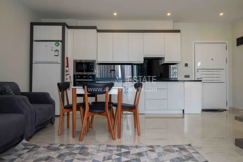 Purchase Furnished flat with mountain and sea views in Mahmutlar 3 